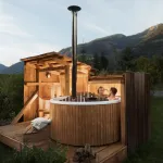 Skargards Panel hottub met interne kachel in een natuurlijk landschap bij zonsondergang
